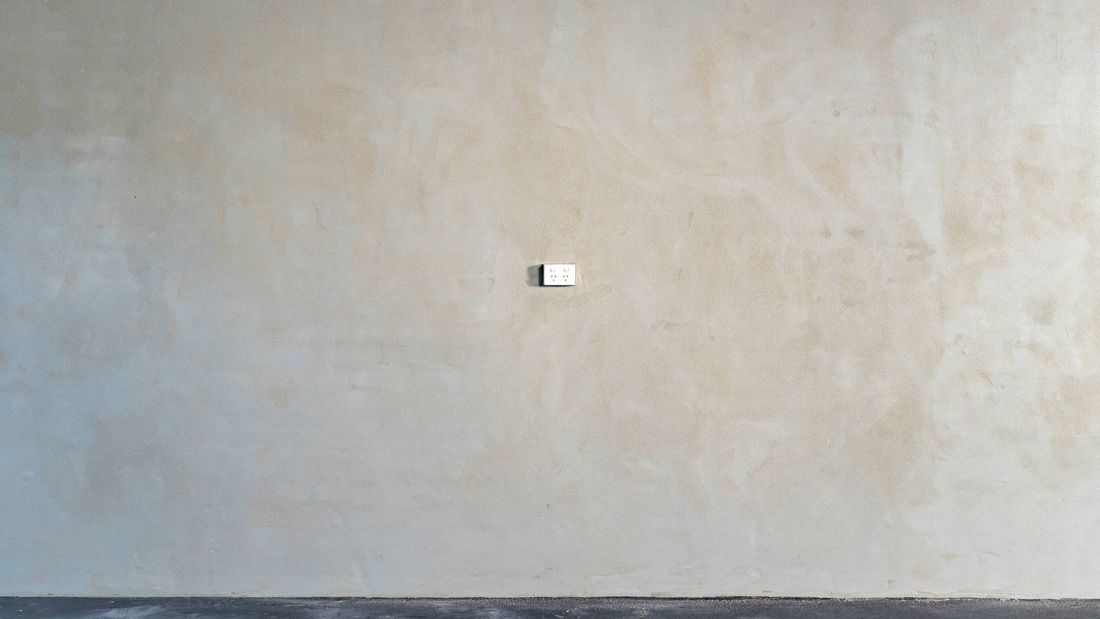 Newly rendered wall with clean finished surface