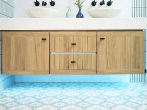 Alt Tag: Floating vanity with hidden LED strip lights in a modern bathroom