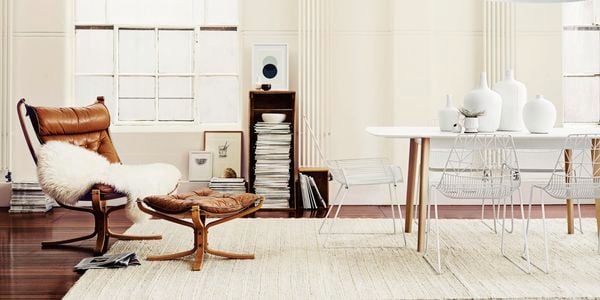 Scandinavian furniture in room with white walls 