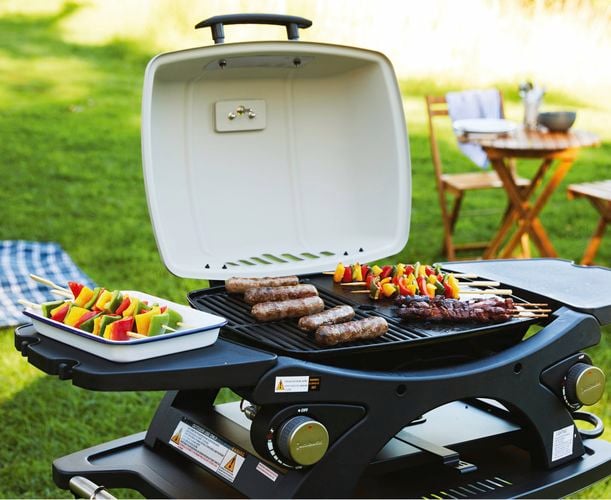 Portable Jumbuck BBQ outside cooking food