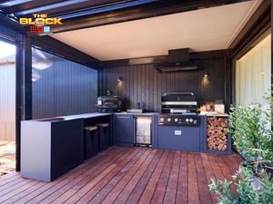 Outdoor area with a Barbecue and kitchen in it on decking.
