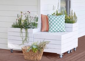 A planter bench photographed on a timber deck
