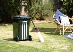 Image of completed pitch with a wheelie bin and bat with ball