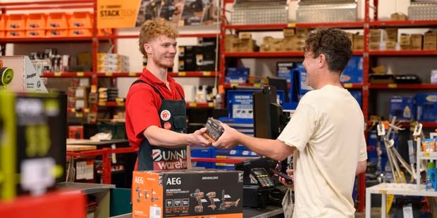Bunnings team member serving a customer instore