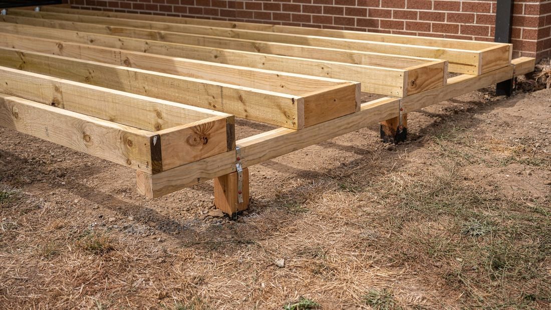 A wooden subfloor for a house