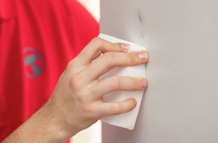 Remove scuff marks from a painted wall with a magic eraser​​​ 