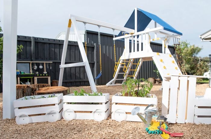 Timber benches are styled as a train 