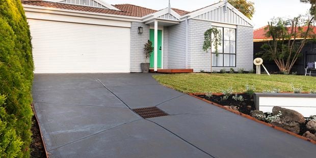 House exterior featuring a garage door.