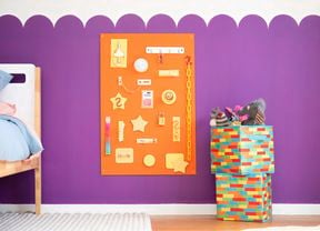 Colourful DIY busy board with interactive hardware pieces