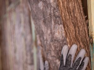 Earthwool insulation being installed