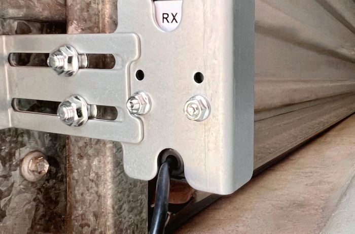 Mounting bracket on side of door