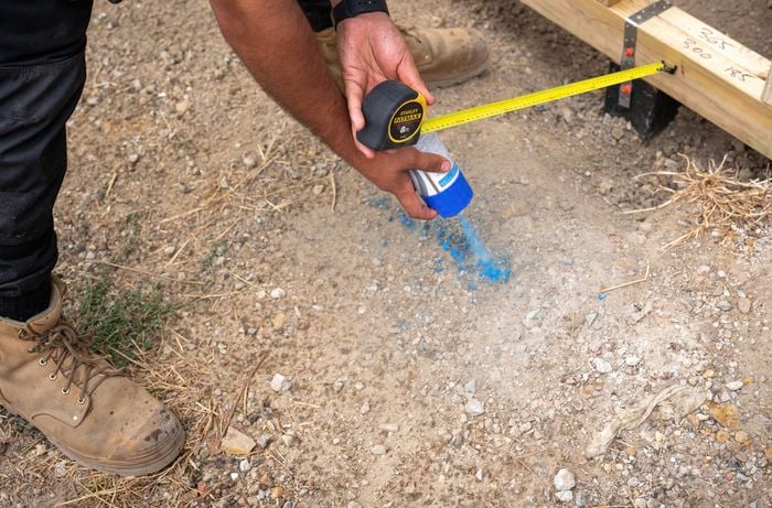 A spot being marked for a post hole