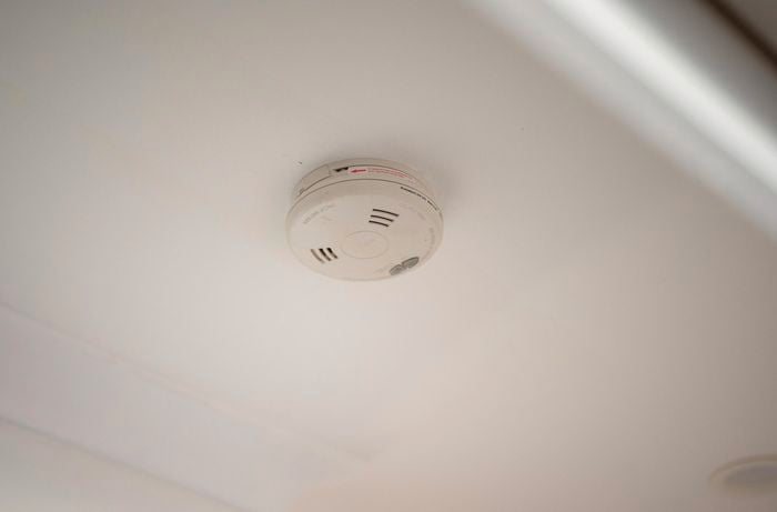 smoke alarm on a wall