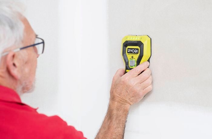 Locate the wall studs using a stud finder