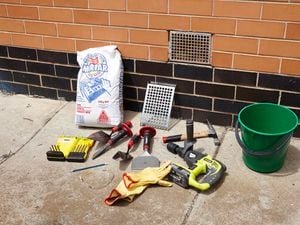 All of the tools and materials you need to replace a vent in a brick wall