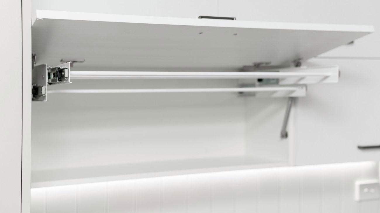Hanging clothes rail.