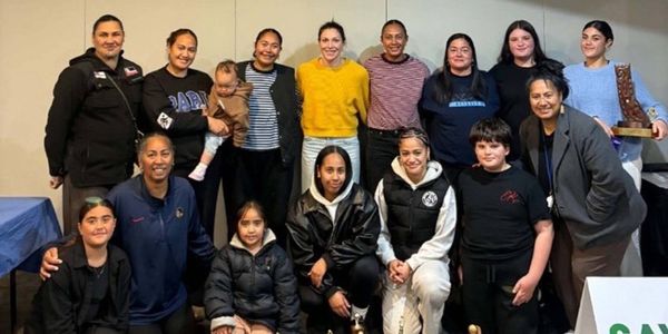Whangaruru Netball Club members, with Sophy Tua pictured second from left in the front row. 