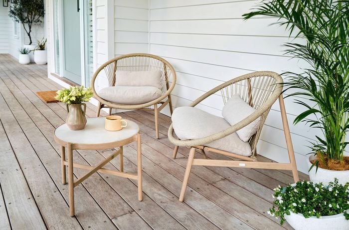 Ourdoor table setting on  decking.