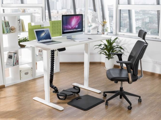 A home office set up with city views.