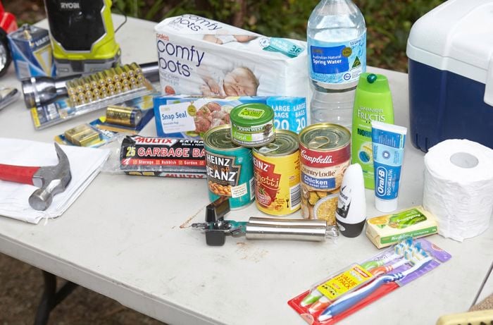 Various essentials, including canned food, batteries, toothpaste, wipes, bottled water and more