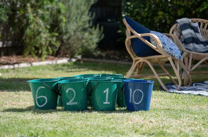 Buckets with numbers on them.