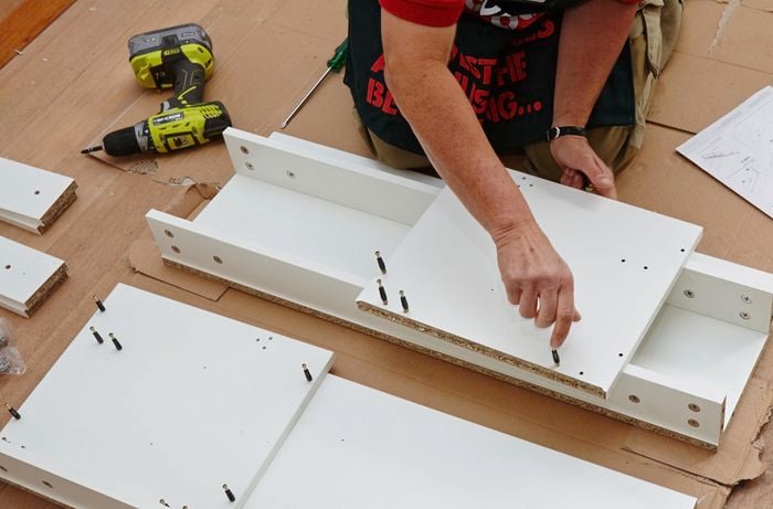Attaching the pins to the side panels