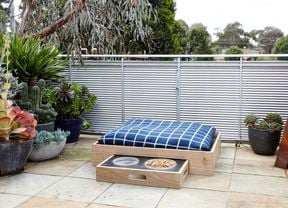 A completed dog feeding station in situ