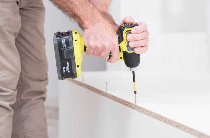 Attach the side panels using a cordless drill