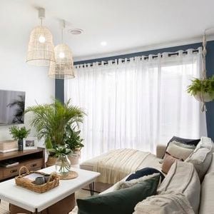 After - Couch - Coffee table - Pendant lights - Sheer curtains - Indoor plants - Lounge - Make It Yours Season 1 - Wide