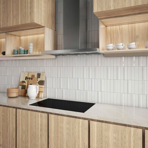 Timber look cabinets with open shelf storage, stainless steel rangehood, cooktop, and white tiled splashback