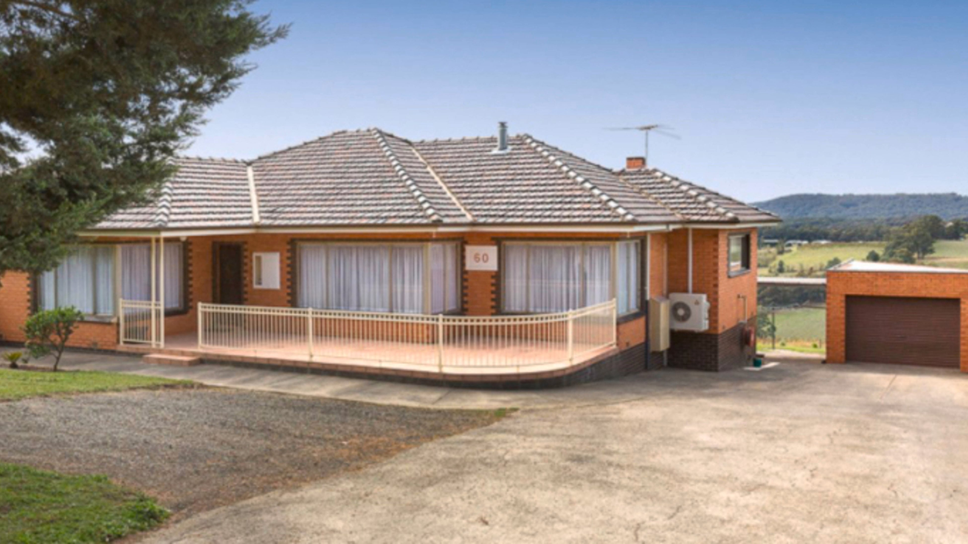 D.I.Y. - Step 1 - Stunning brick home transformation with weatherboards