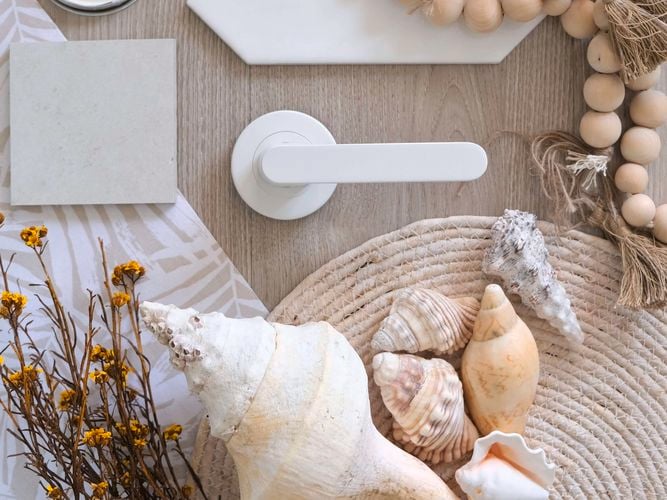 White
  door hardware for coastal interior design