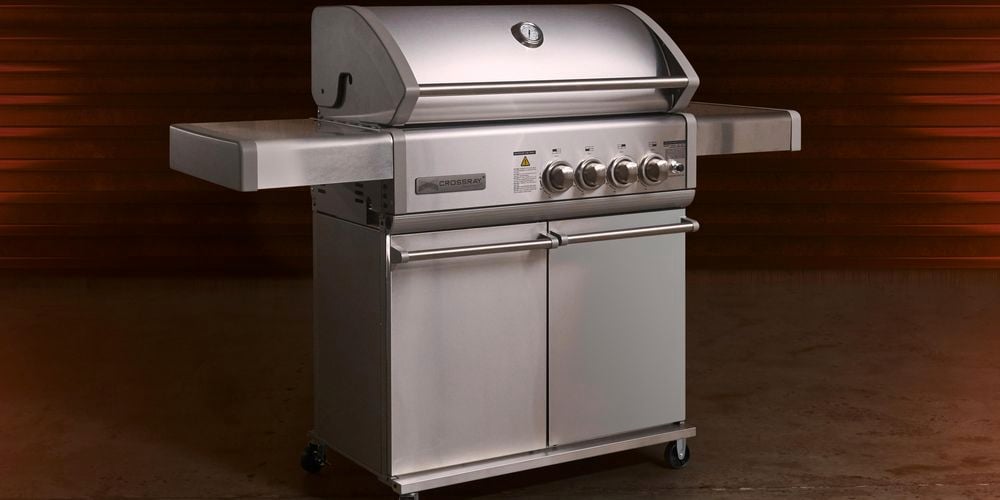 gas burner bbq on a red and black background
