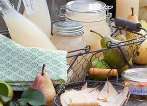 Display of products made after learning how to preserve fruit including juice, chutney and dried pear