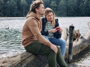 two people at a campsite