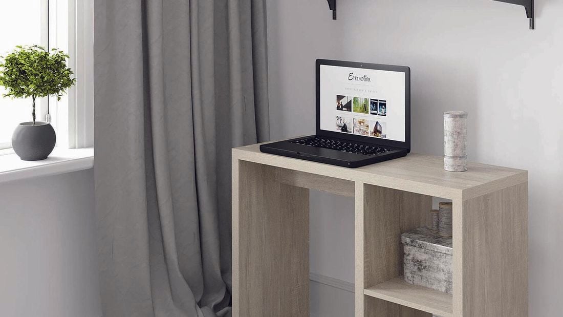 Shelving unit with a computer on it and shelves on a wall