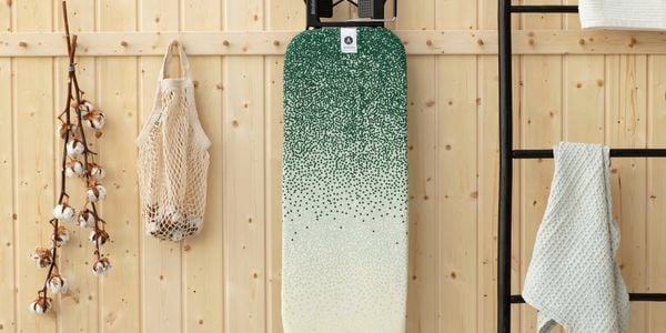 Ironing board in an upright position 