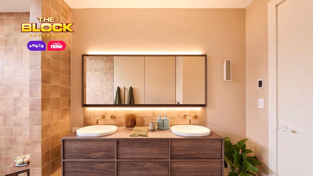 Natural coloured brown bathroom with timber vanity, 2 white round basins and shower