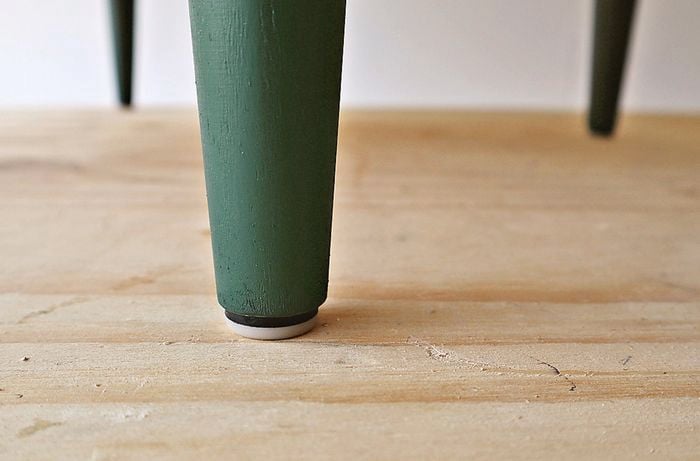 Glides added to the bottom of bedside table legs