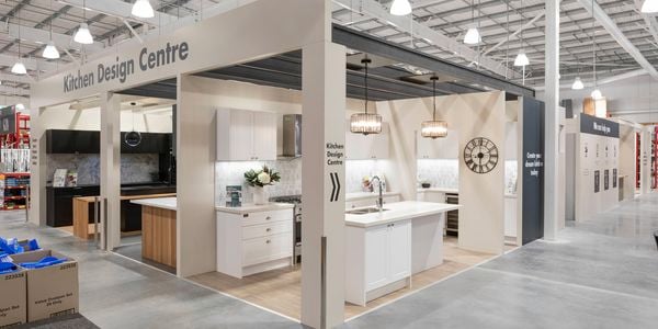 Kitchen Design Centre at Bunnings featuring fully built kitchen displays with islands, cabinetry, lighting and appliances.
