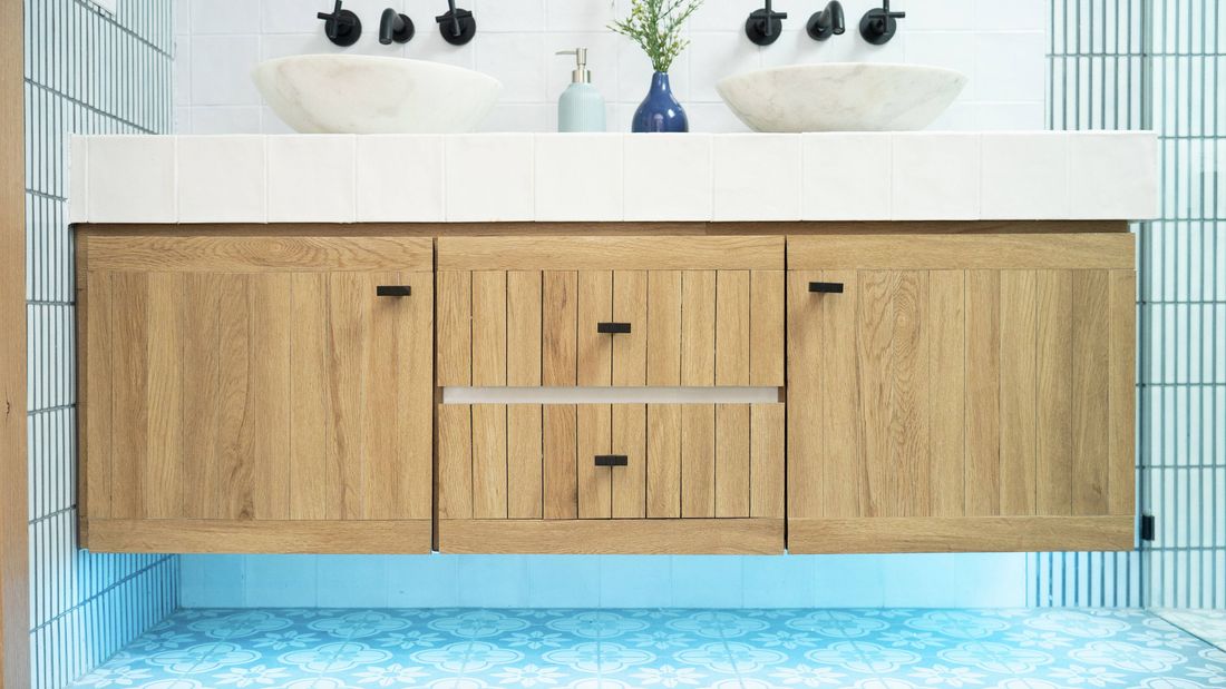Alt Tag: Floating vanity with hidden LED strip lights in a modern bathroom