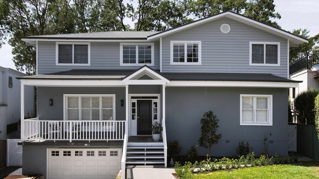 Two storey grey American East Coast style house.