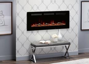 Electric fireplace in bedroom with wallpaper and timber flooring