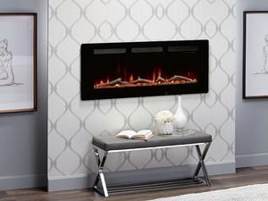 Electric fireplace in bedroom with wallpaper and timber flooring