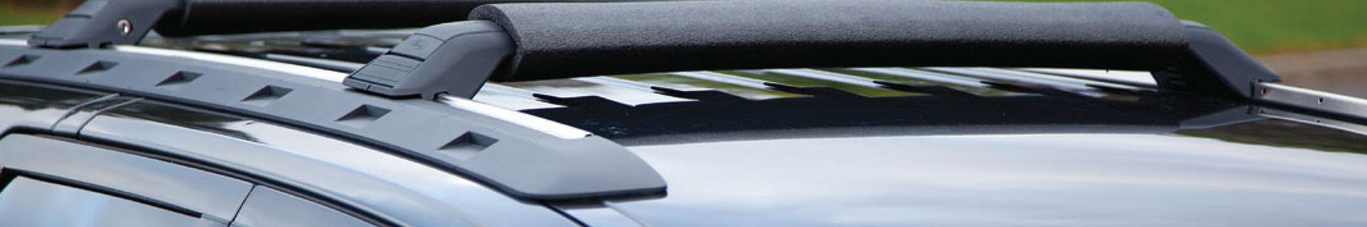 K-Flex foam pipe insulation being used to protect the roof racks on a car