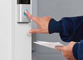 Person ringing the ring security doorbell camera
