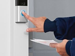 Person ringing the ring security doorbell camera