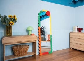 Colourful throwback mirror as a retro room feature