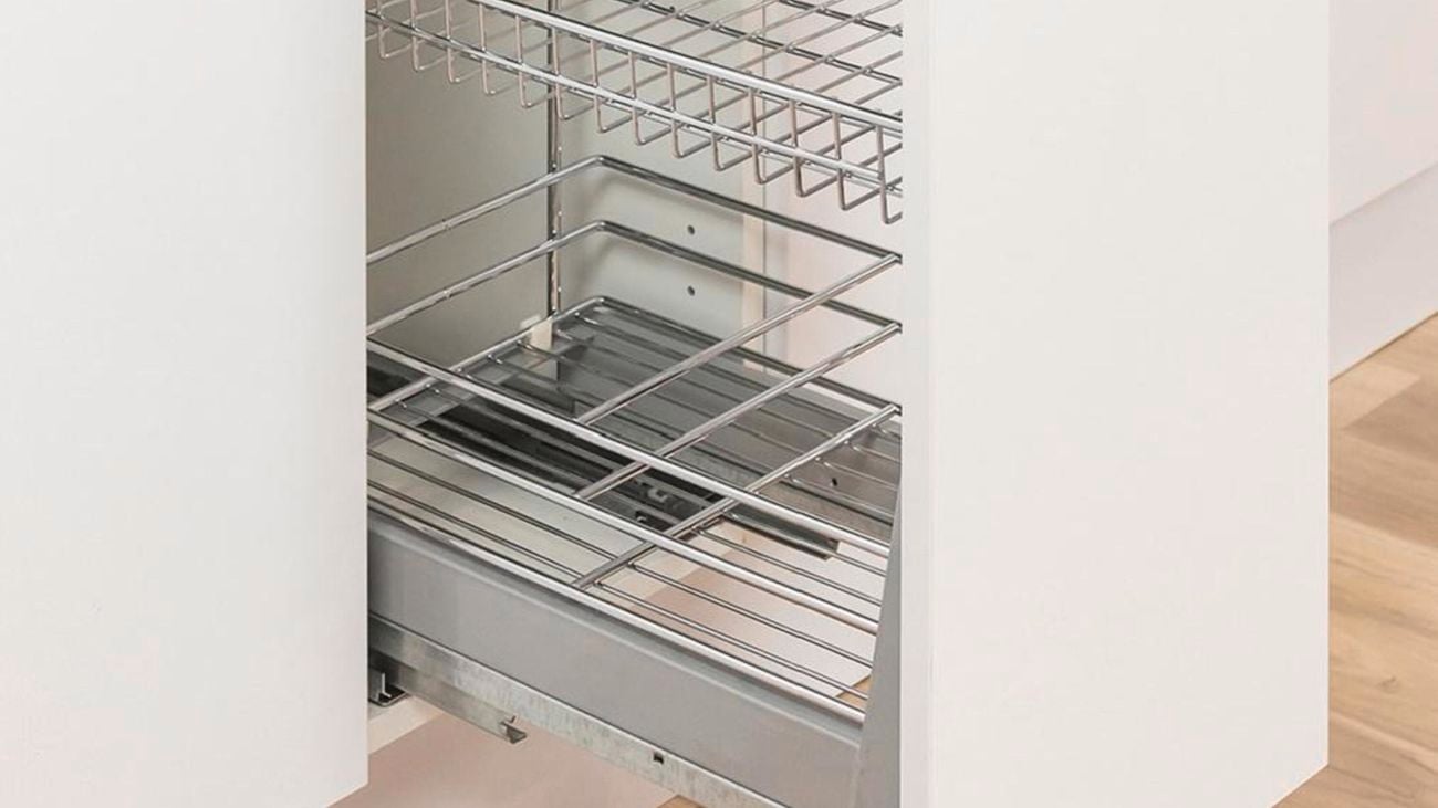 A wireware drawer divider into a kitchen cabinet.