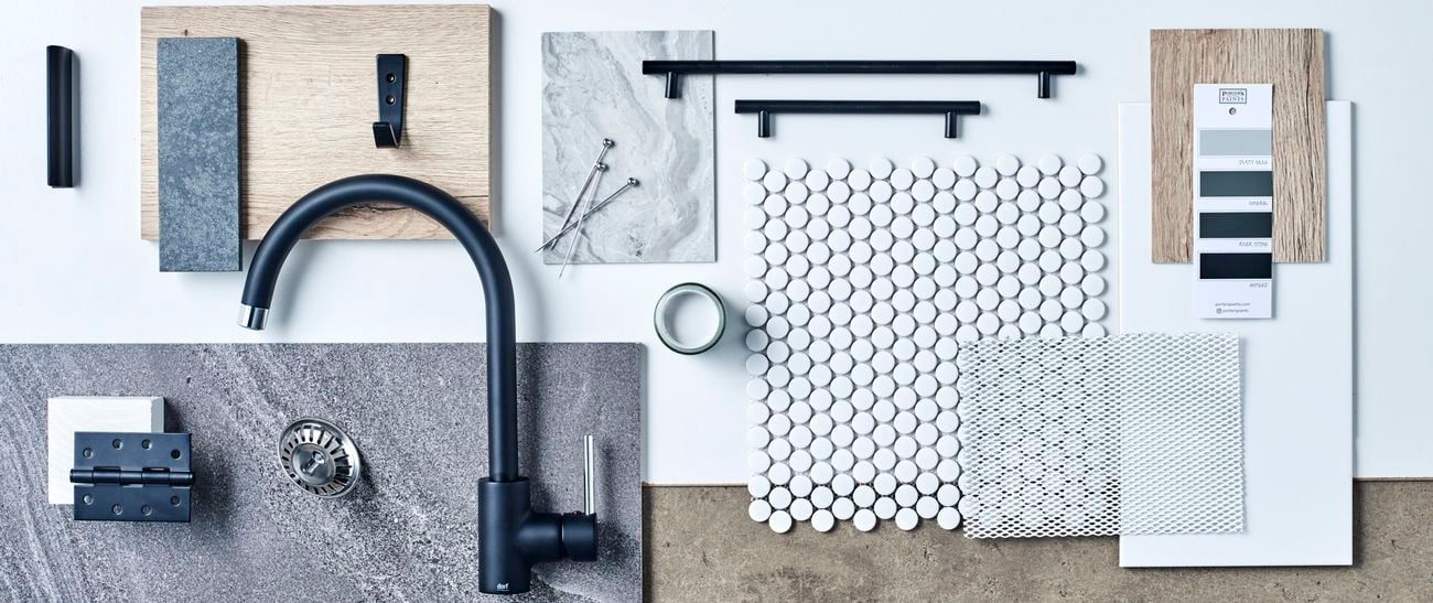 All the materials and design for the makeover laid out on the table